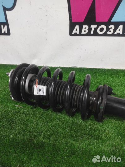 Стойка амортизатора передняя левая Tesla Model 3