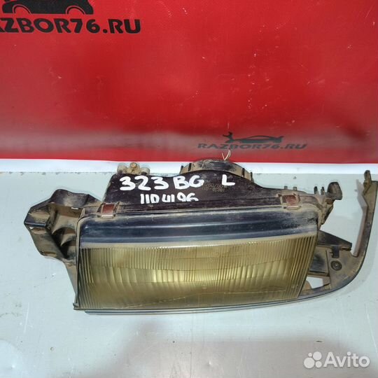 Фара левая Mazda 323 BG седан
