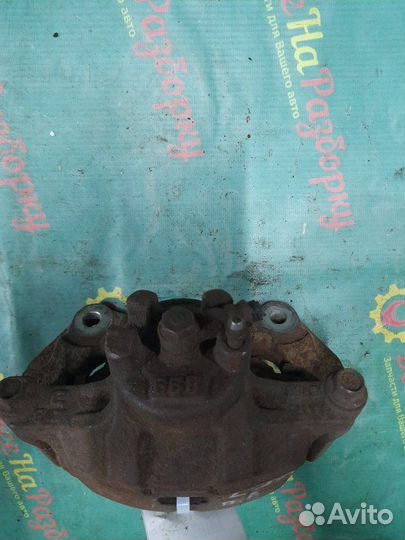 Суппорт передний левый Mitsubishi Lancer 10 седан