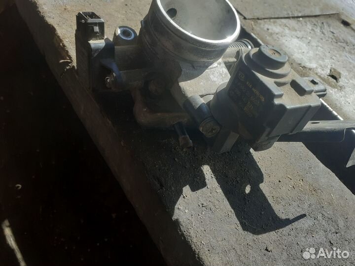 Дроссельная заслонка Kia Spectra