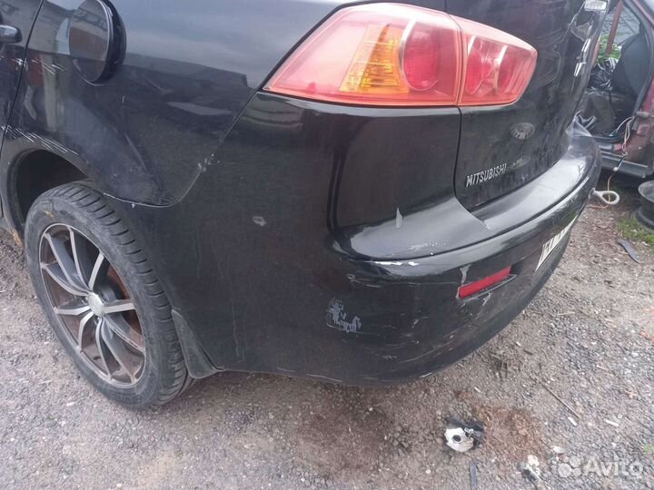 Задний бампер Mitsubishi Lancer 10