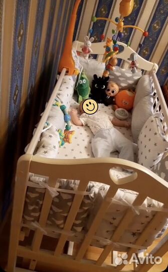 Детская кроватка с универсальным маятником