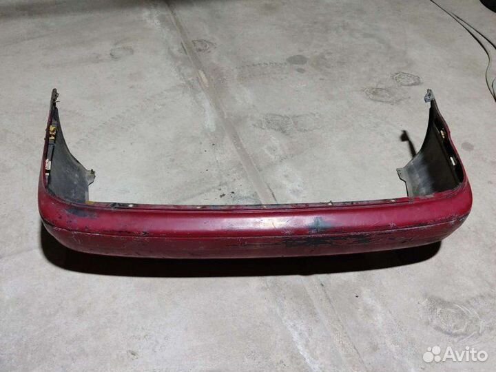 Бампер задний Toyota Carina E 1996