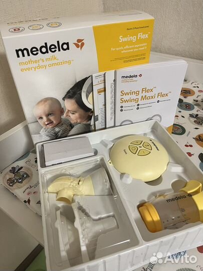 Молокоотсос medela swing flex