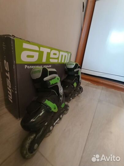 Роликовые коньки