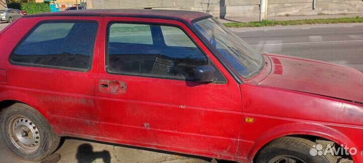 Передний правый стеклоподъёмник Гольф 2 трехдверка