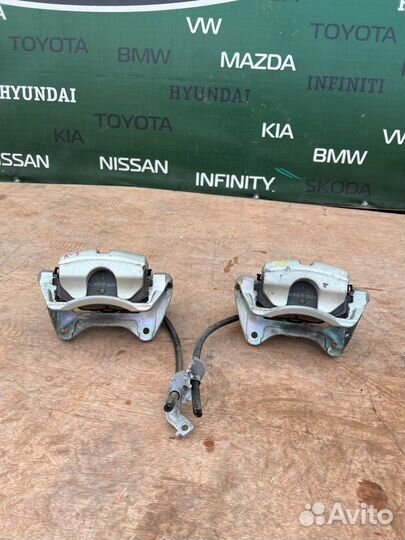 Суппорт тормозной передний Kia K5 DL3 2.5 G4KN