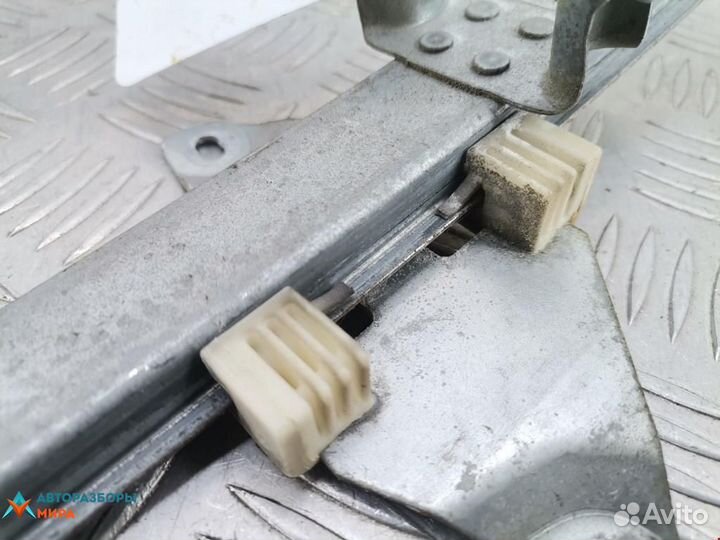 Стеклоподъемник передний левый Nissan Almera Tino