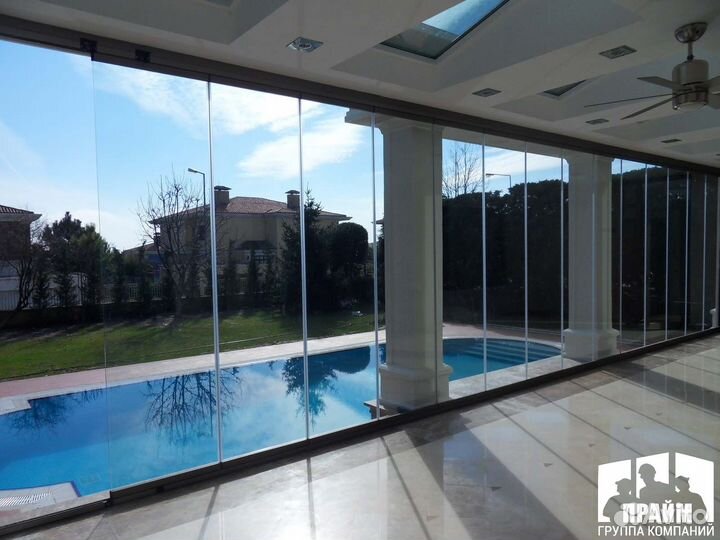 Раздвижное безрамное остекление для дома