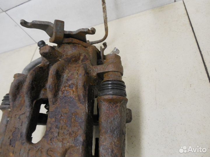 Суппорт задний левый Focus I 1998-2004