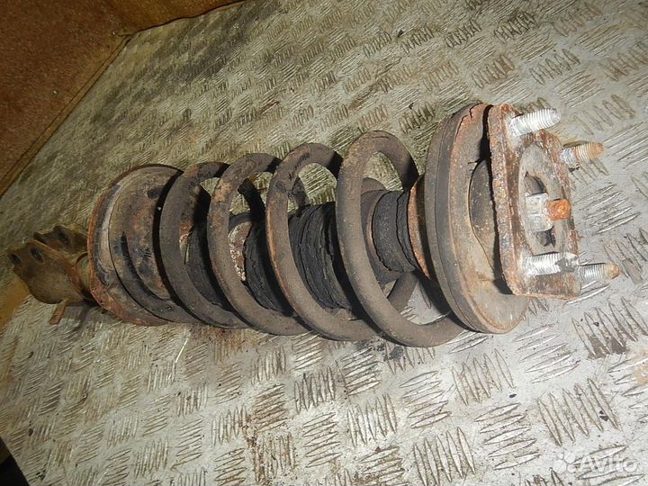 Амортизатор передний левый, Mazda -CX-7 (07)