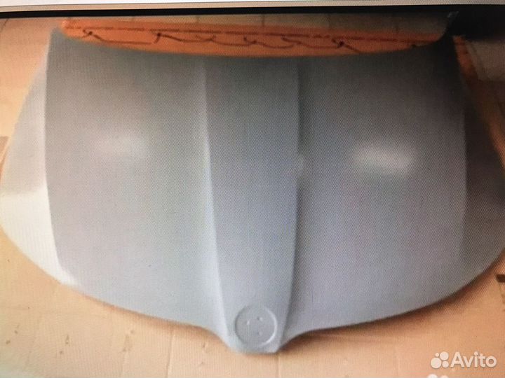 Шкода Рапид капот