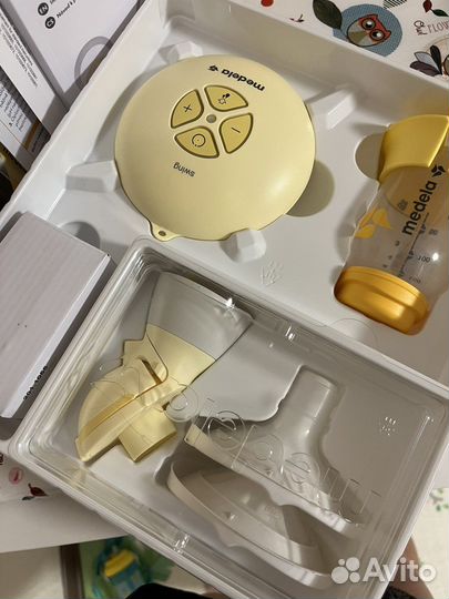 Молокоотсос medela swing flex