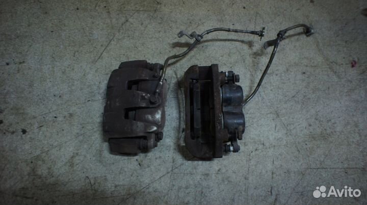 Суппорт Додж Рам 1500 2009-2018 R8037147AB