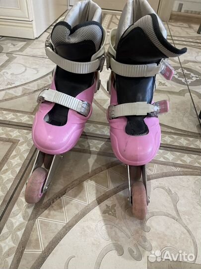 Роликовые коньки