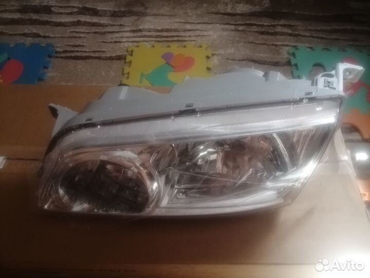 Новая оригинальная фара левая Hyundai Starex H1