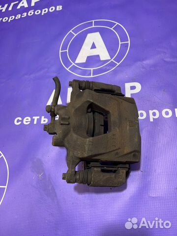 Суппорт передний левый Opel Astra J A16XER 2012