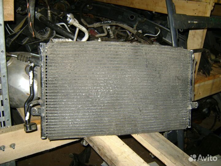 Радиатор кондиционера Mitsubishi Carisma Каризма