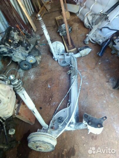 Задняя балка Рено Логан