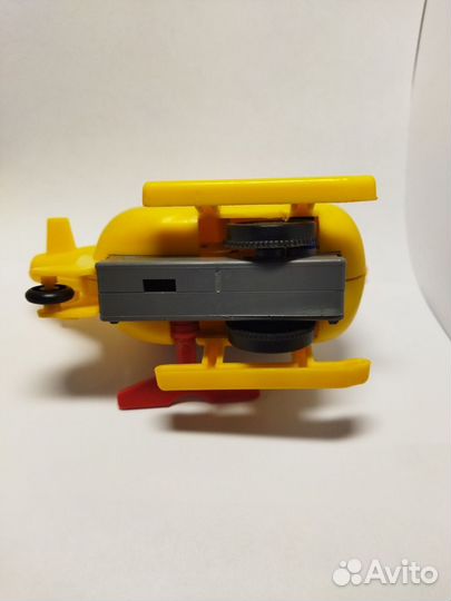 Игрушка механическая,заводной вертолет Завод Парус