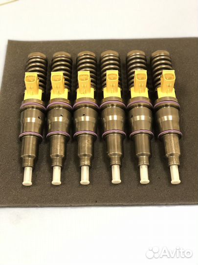 Насос форсунки Volvo D13 21340611