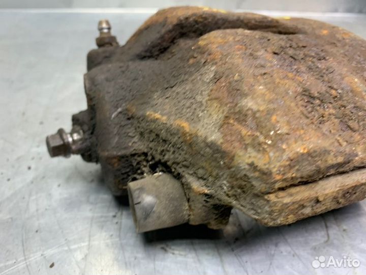 Суппорт тормозной передний левый Skoda Octavia (A5