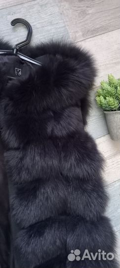 Меховая жилетка