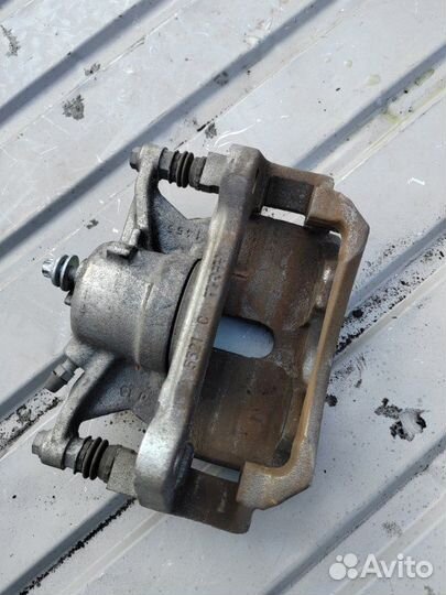 Суппорт тормозной передний левый Audi A3 8V CXS