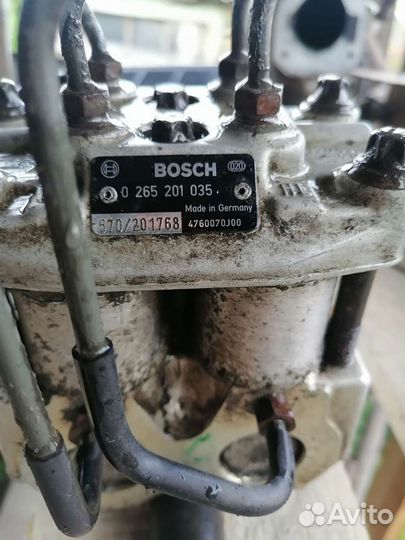 Блок ABS Nissan Primera P10