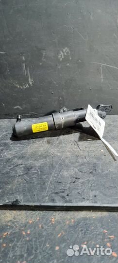 Форсунка омывателя фар Volvo V50