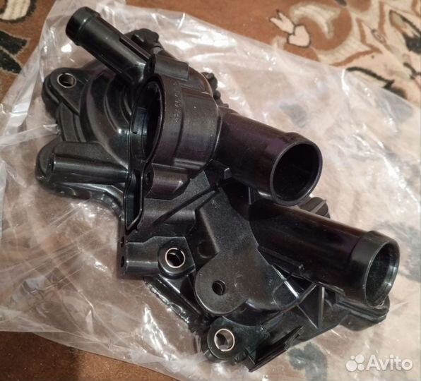 Помпа термостат Шкода