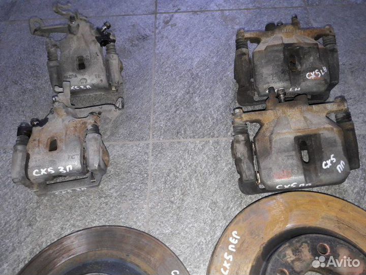 Суппорт тормозной диск Mazda Cx5