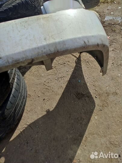 Задний бампер Mazda Demio DW