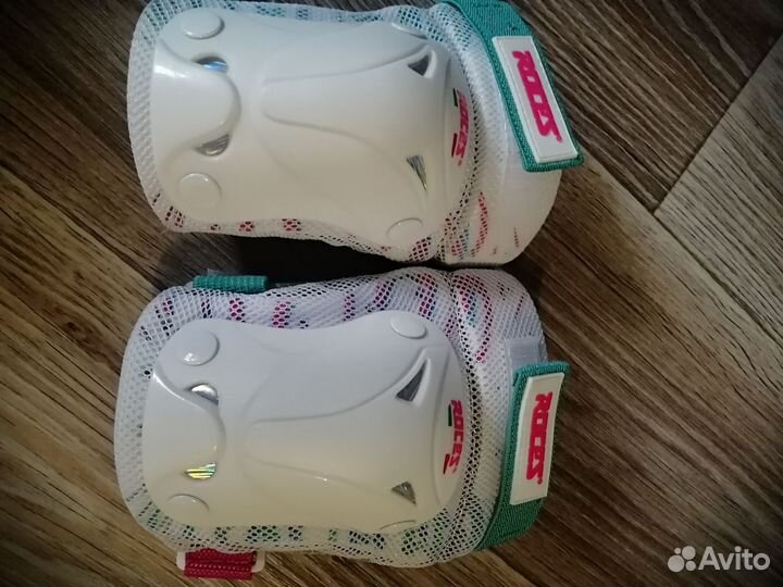 Роликовые коньки