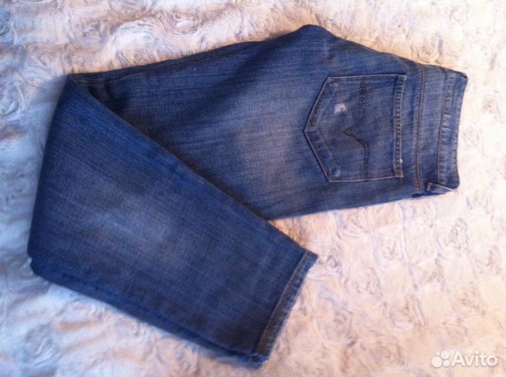 Джинсы versace