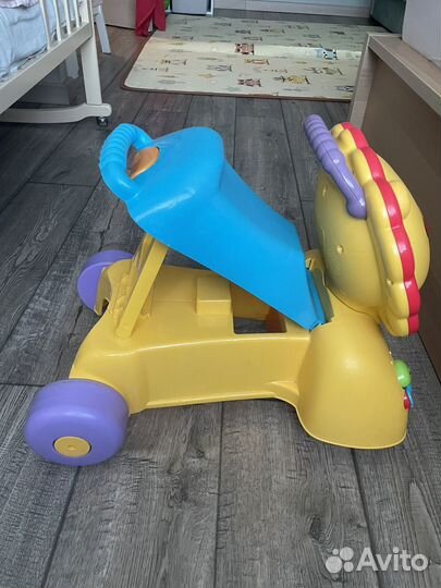 Каталка лев fisher price