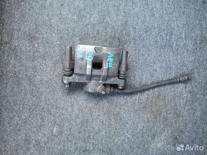 Тормозной суппорт левый задний лансер 9