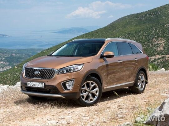 Стекло фары Kia Sorento UM