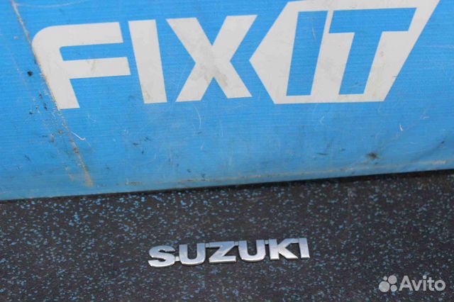 Эмблема Suzuki SX4 (Сузуки сх4) YB11S 7783154gb00p