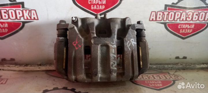 Суппорт тормозной передний правый Honda Cr-V RM4