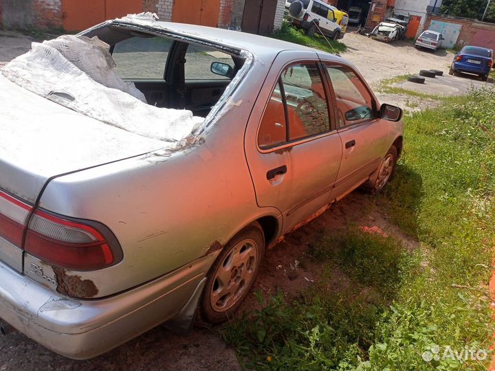 Салон Nissan Sunny B14