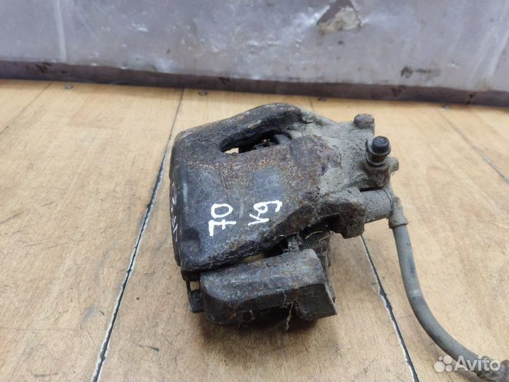 Тормозной суппорт передний левый Opel Astra H