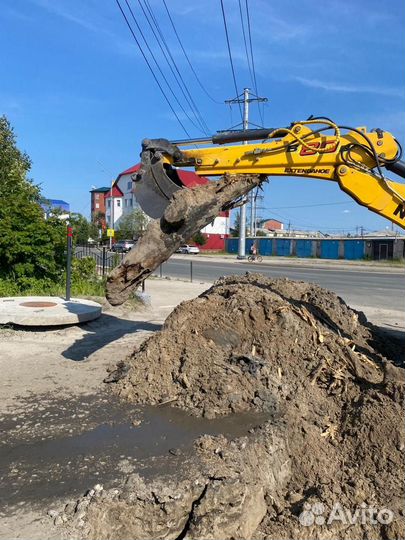 Эксковатор-погрузчик