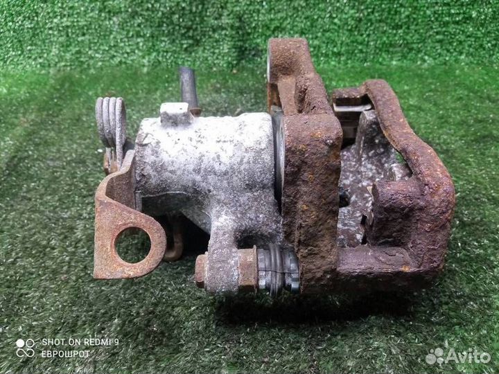 Суппорт задний левый Opel Astra H (2004-2014)