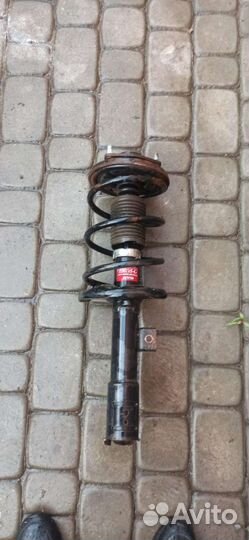 Стойка передняя правая Mitsubihi Lancer 10