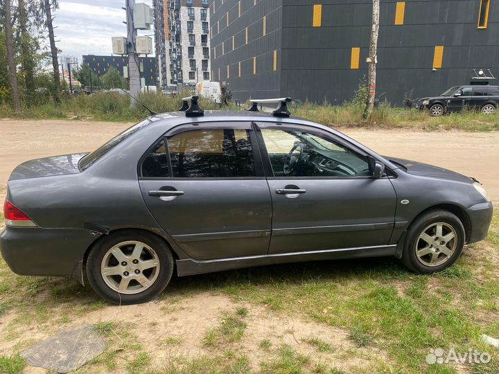 Mitsubishi Lancer 1.6 МТ, 2005, 202 000 км