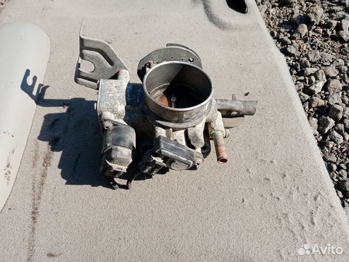 Заслонка дроссельная на Шевроле Эванда 2006