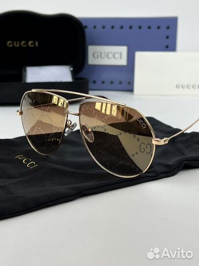 Солнцезащитные очки Gucci