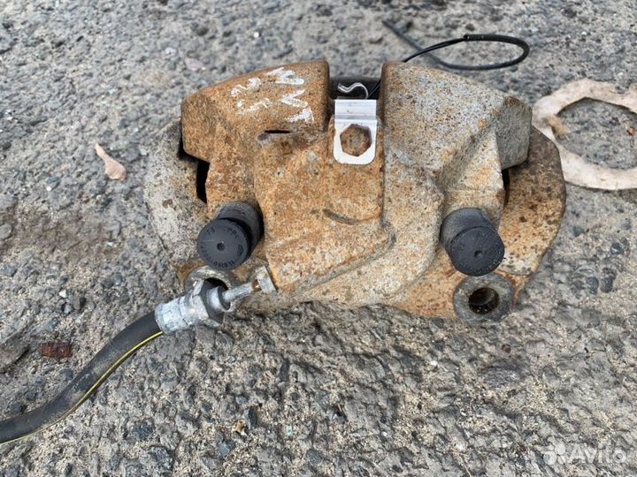 Суппорт тормозной передний правый Volkswagen