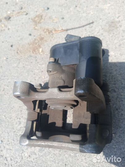 Суппорт задний левый и правый на Пассат б6, Тигуан